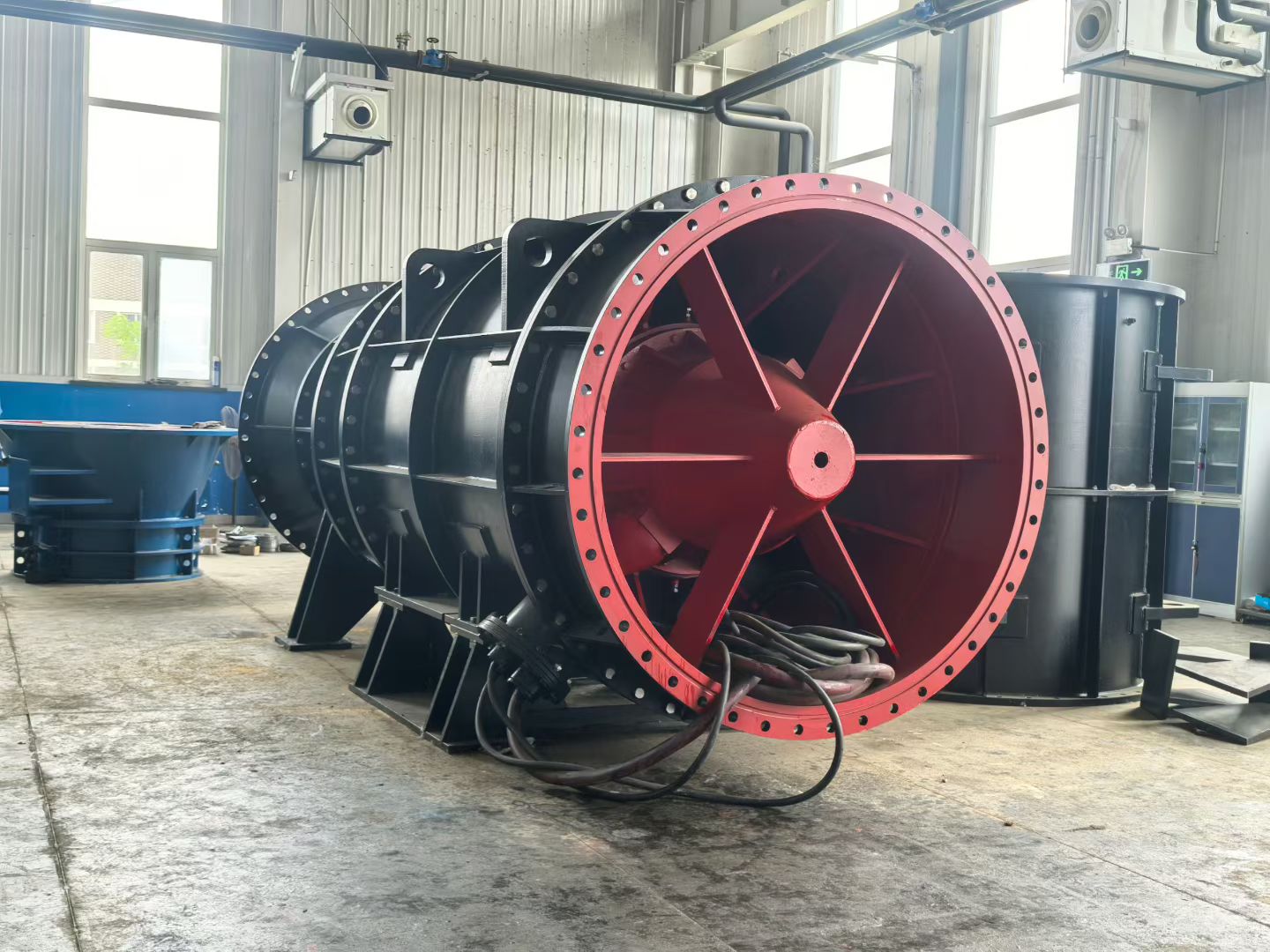 Ganquan bidirectional tubular pump with a red flanged opening in the factory