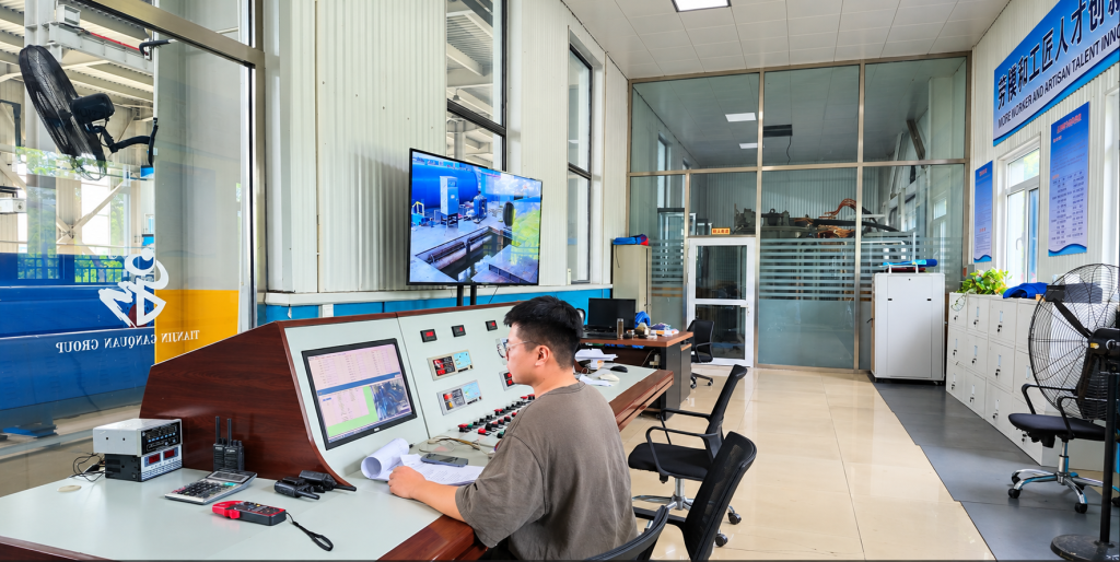 Personnel operating equipment at Ganquan’s pump testing station